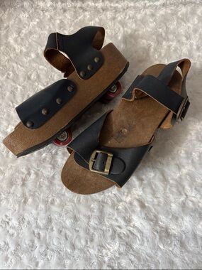 Vintage Italian made retractable roller sandals